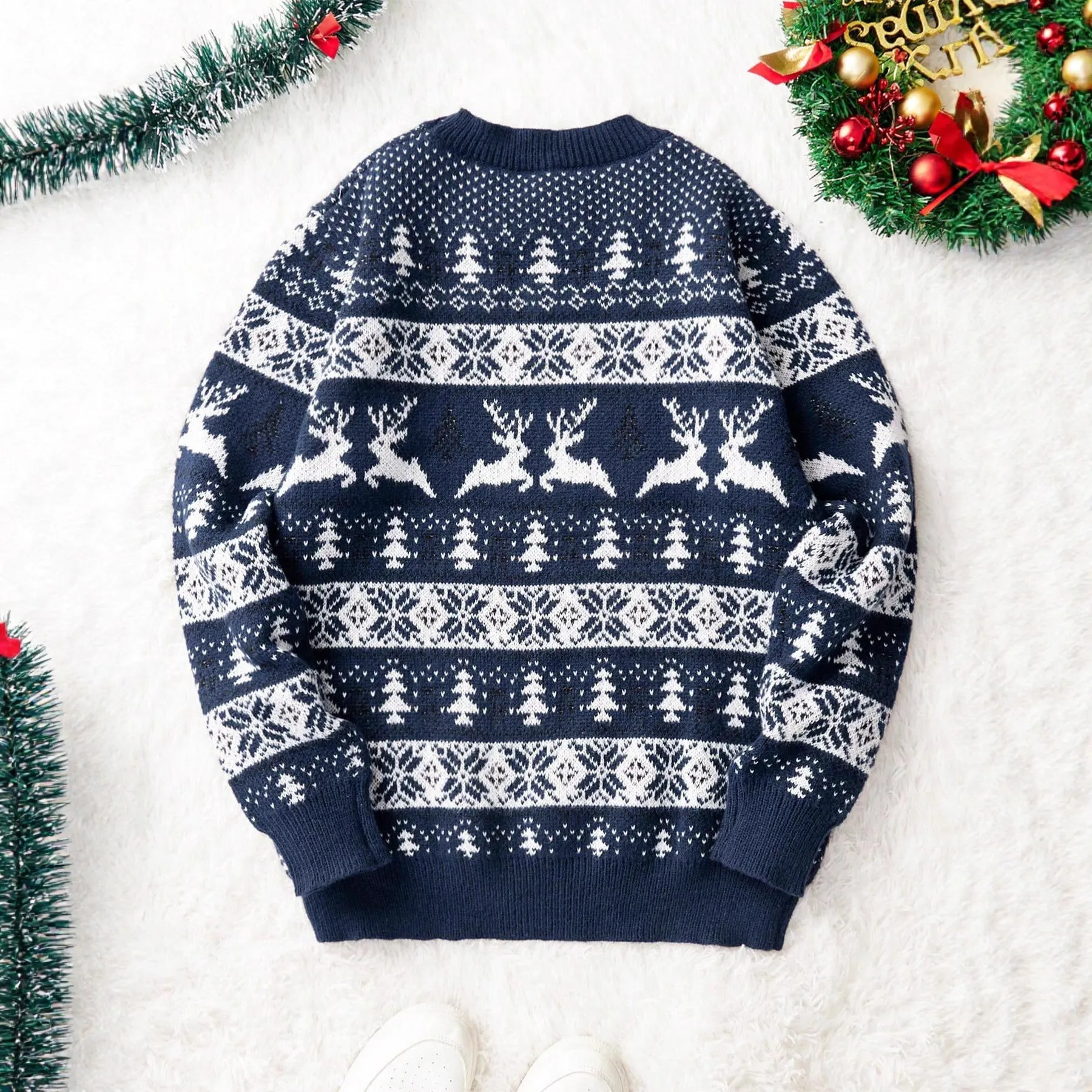 Men's red jacquard Christmas sweater with round neck and long sleeves on a model