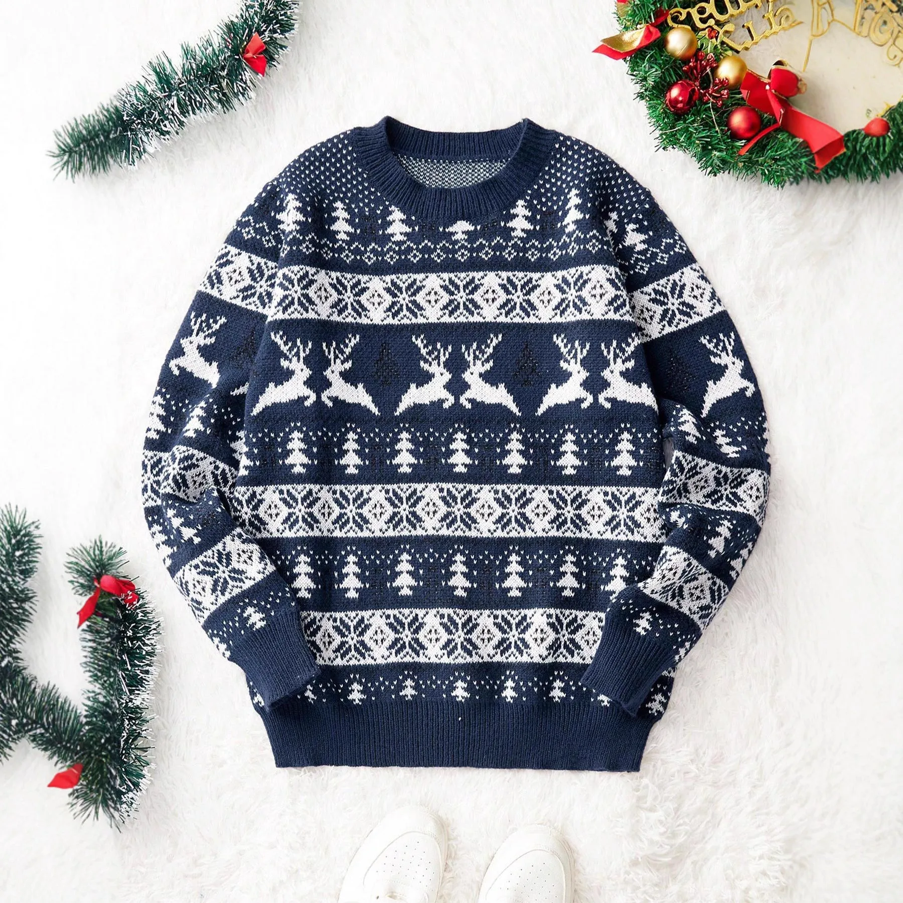 Men's red jacquard Christmas sweater with round neck and long sleeves on a model