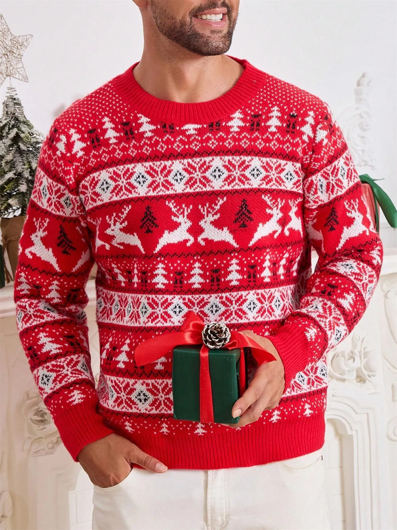 Men's red jacquard Christmas sweater with round neck and long sleeves on a model