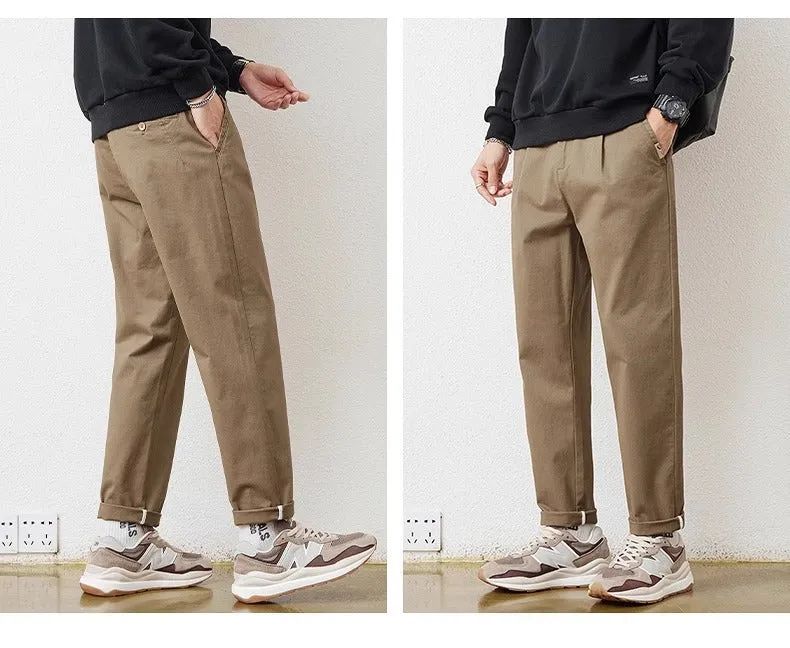 Men's loose wide-leg casual pants in dark khaki with zipper fly and mid-rise waist on a plain background