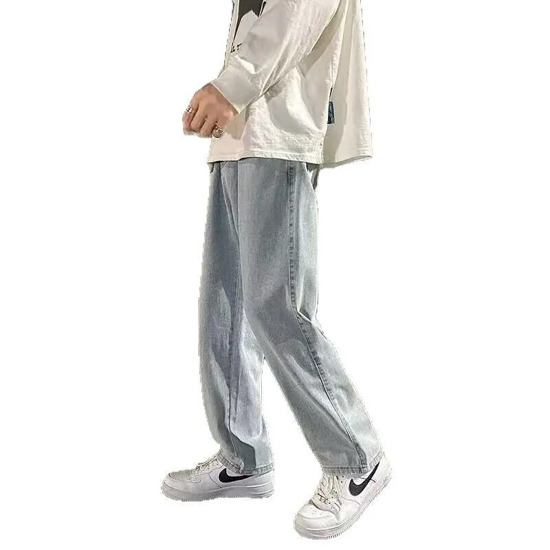 Men's smoke gray loose wide-leg straight jeans with drawstring waist, front view
