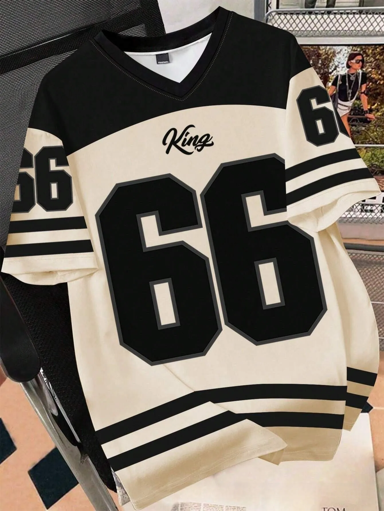Man wearing a loose grey T-shirt with a large, detailed 3D printed Chicago No 23 graphic on the front.