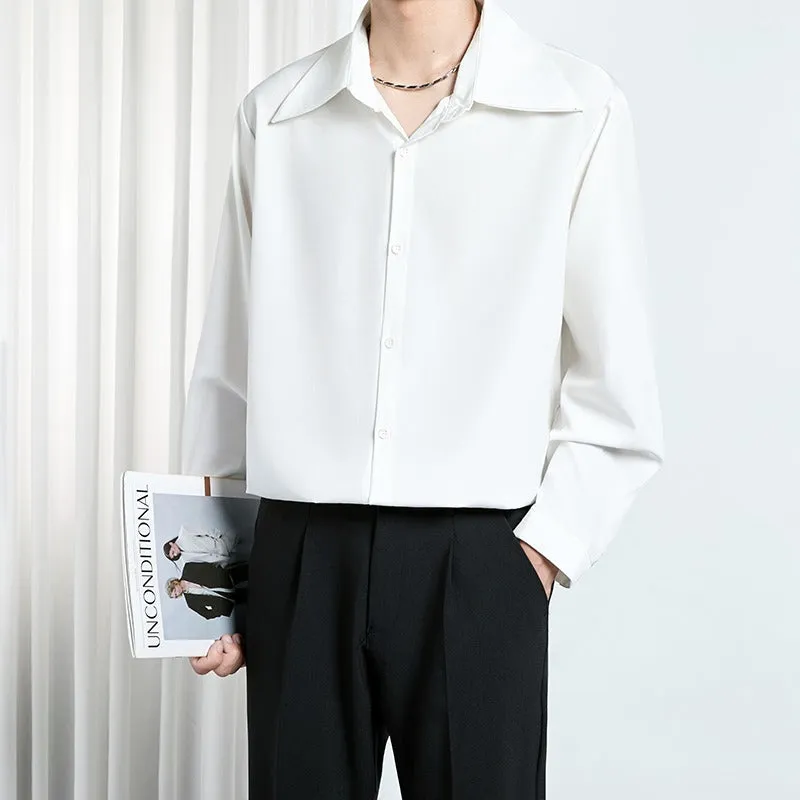 Men's loose non-iron polyester shirt in black and white, front view, with casual styling