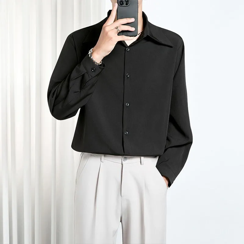 Men's loose non-iron polyester shirt in black and white, front view, with casual styling