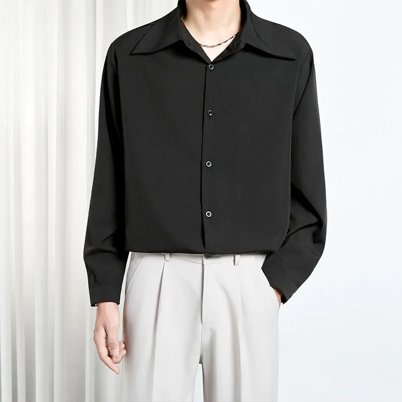 Men's loose non-iron polyester shirt in black and white, front view, with casual styling