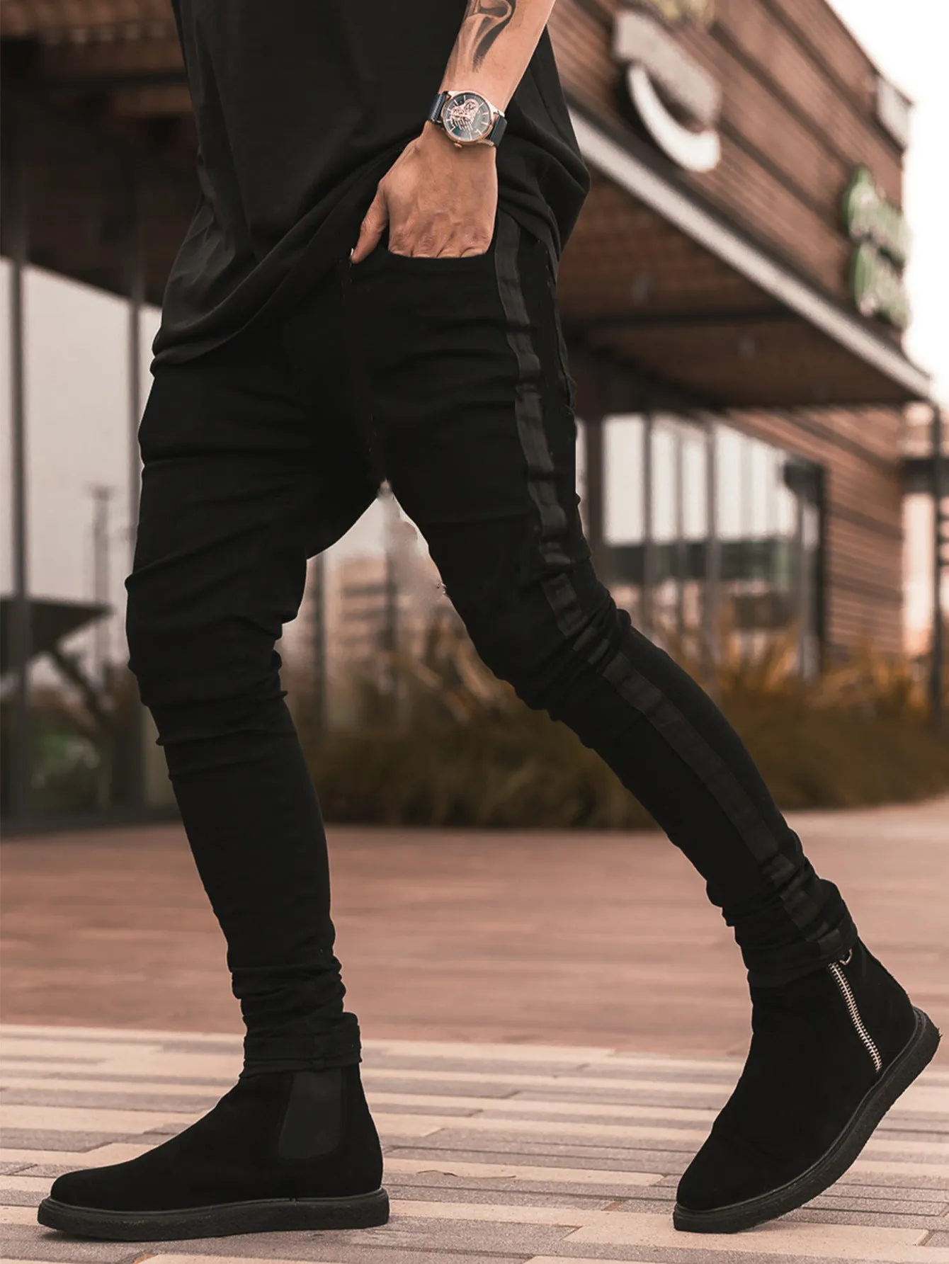 Men's ripped black slim-fit high waist cotton denim trousers with elastic waist