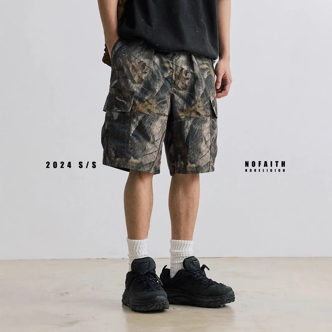 Men's loose fit denim shorts in army green with an elasticated waistband and straight leg.
