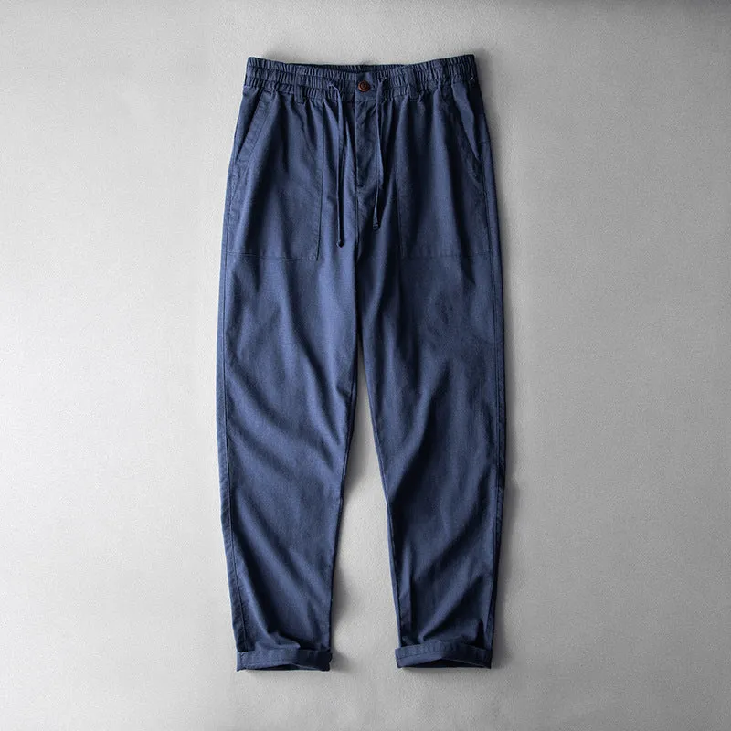 Men's linen casual trousers in solid colour with mid waist design available in three colour options