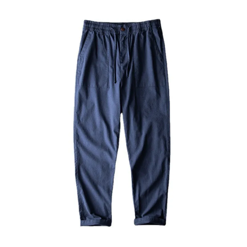 Men's linen casual trousers in solid colour with mid waist design available in three colour options