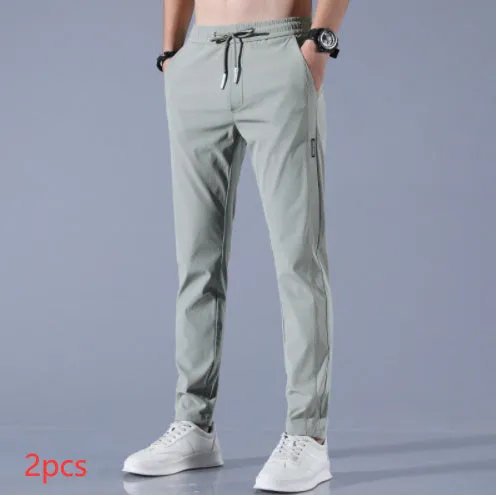 Men's summer ice silk stretch straight sports trousers in loose fit with drawstring, available in black, dark gray, light gray, light green