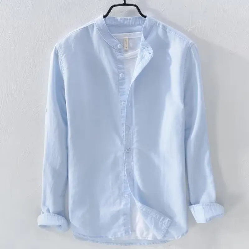 A man's loose-fitting, long-sleeve casual shirt in a cotton linen blend, shown in a solid colour.