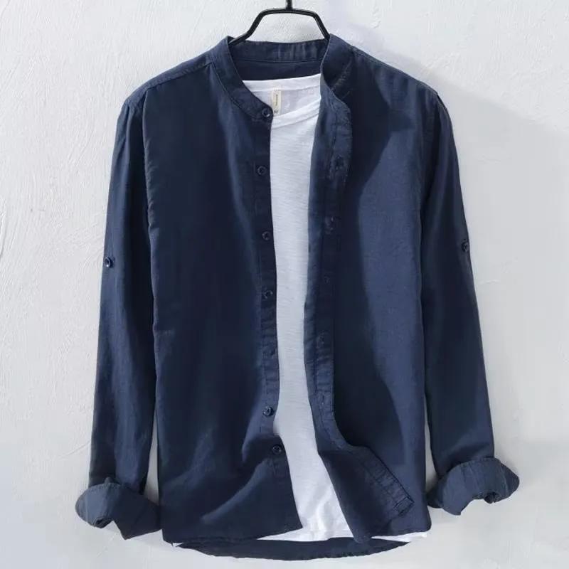A man's loose-fitting, long-sleeve casual shirt in a cotton linen blend, shown in a solid colour.
