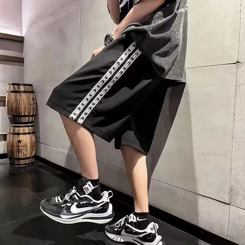 Men's loose fit baggy track pants in black, light grey, and dark grey colours with micro elastic fabric