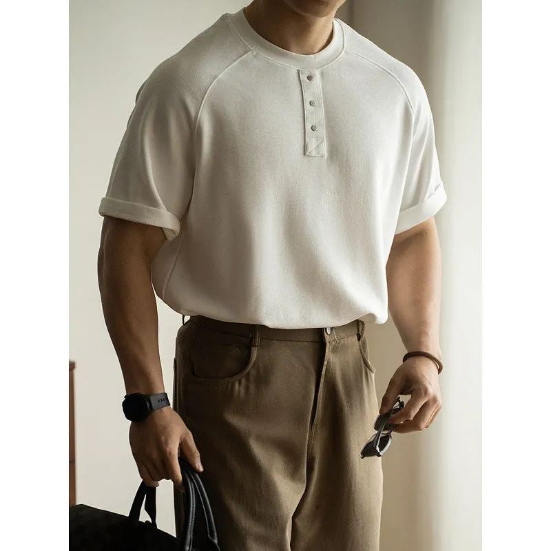Casual loose top with terry texture fabric and raglan sleeves in three colour options