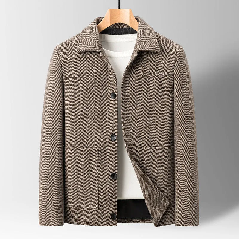 Men's slim lapel woolen jacket in gray with non-ironing finish and side patch pockets on a plain background
