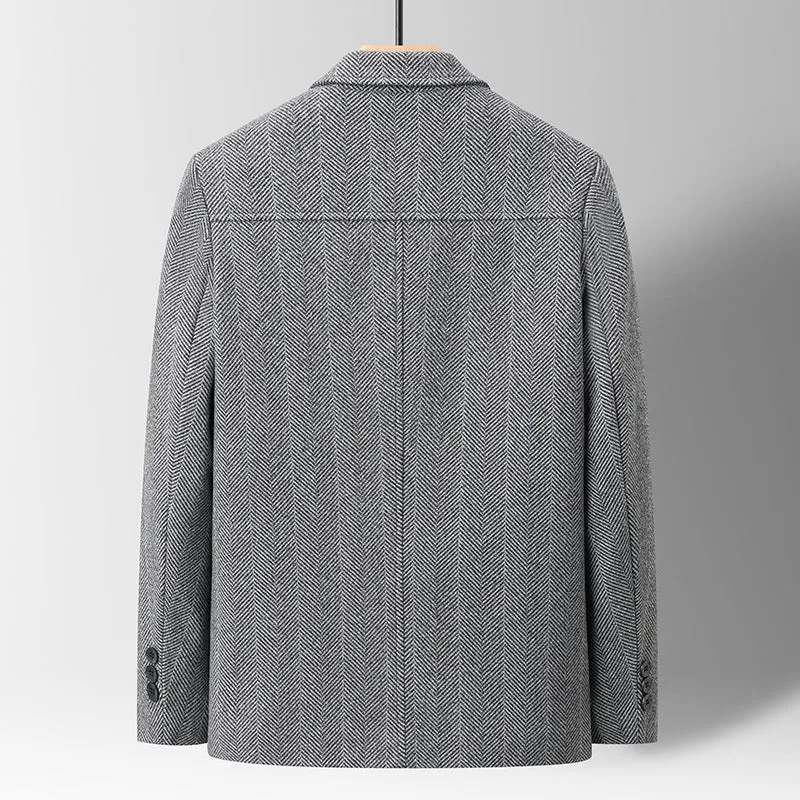 Men's slim lapel woolen jacket in gray with non-ironing finish and side patch pockets on a plain background