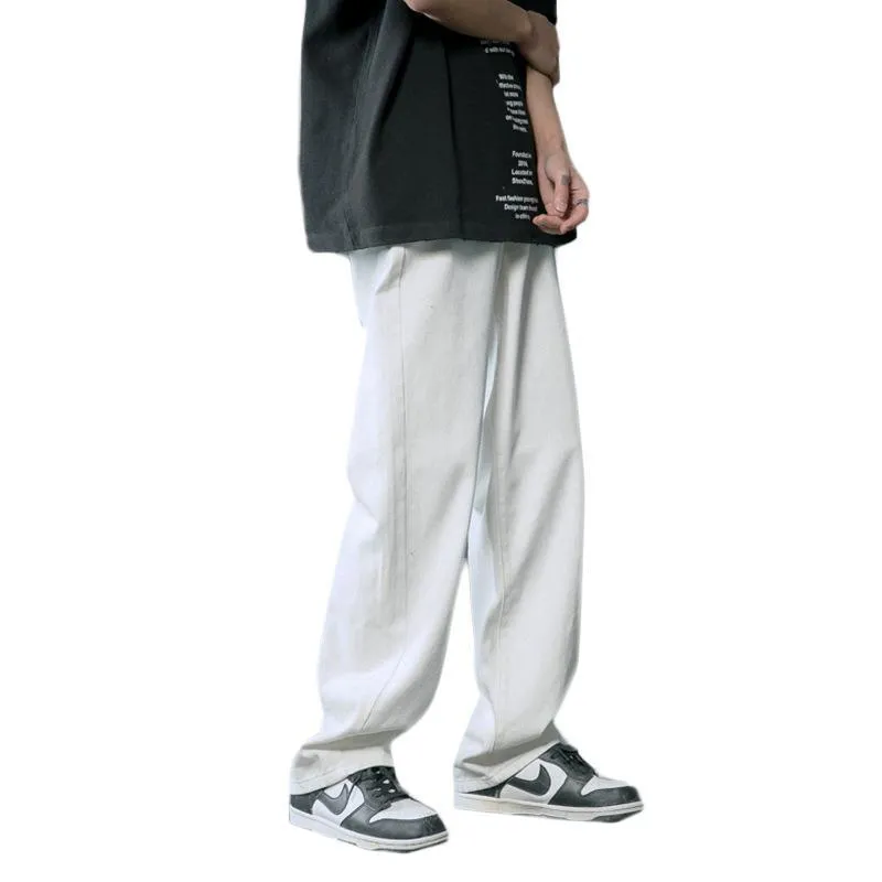 Loose straight cotton denim jeans for men in light blue colour with mid waist and button fly