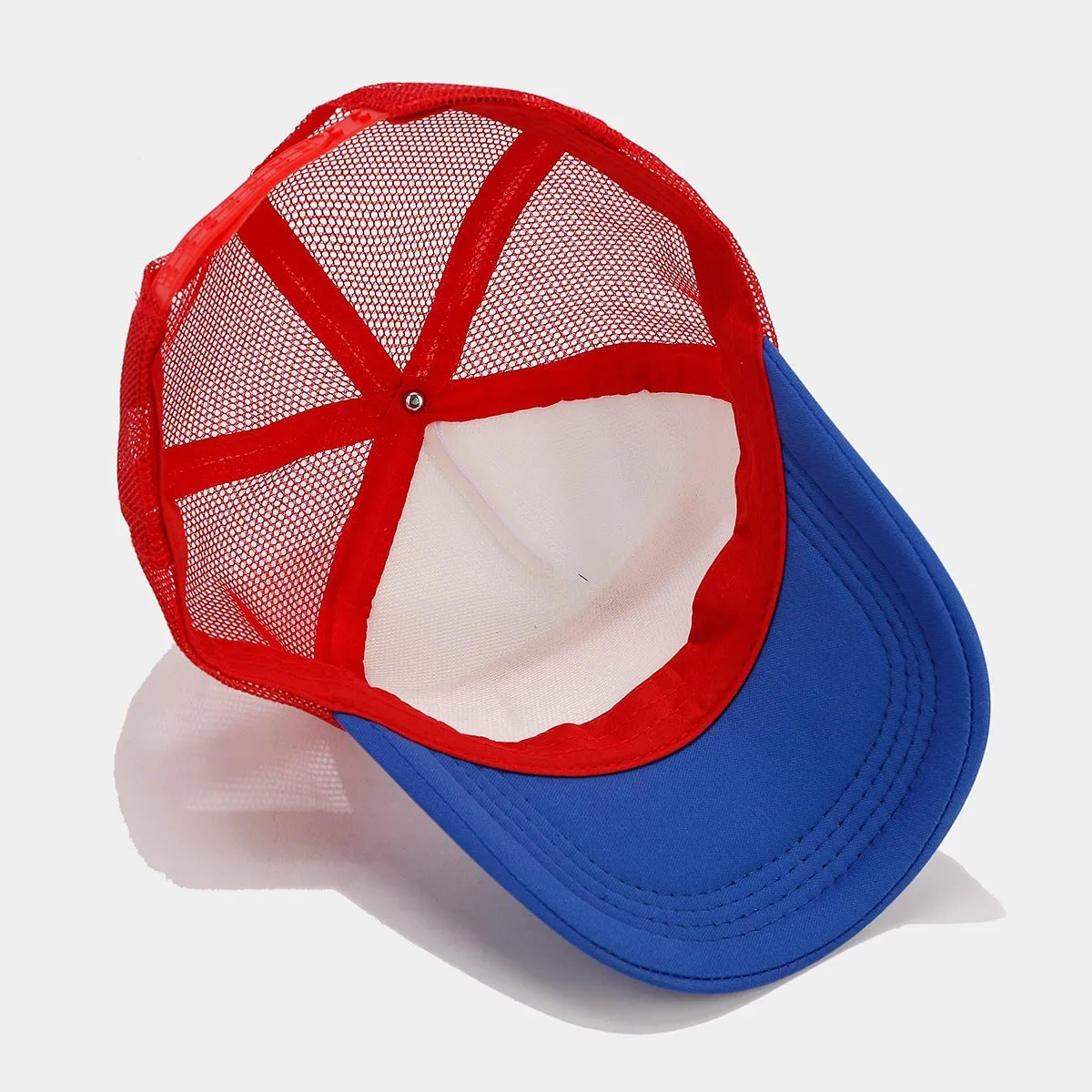 Red and blue contrast mesh baseball cap with adjustable strap and dome crown