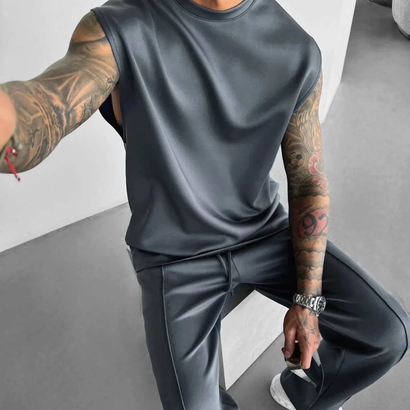 Men's two-piece suit set with trousers and vest in simple style, available in multiple colours, polyester fabric