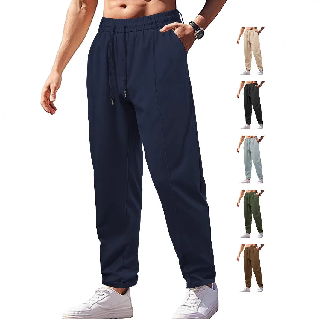 Men's high-waist drawstring casual trousers in cotton-like polyester fabric, available in six colours