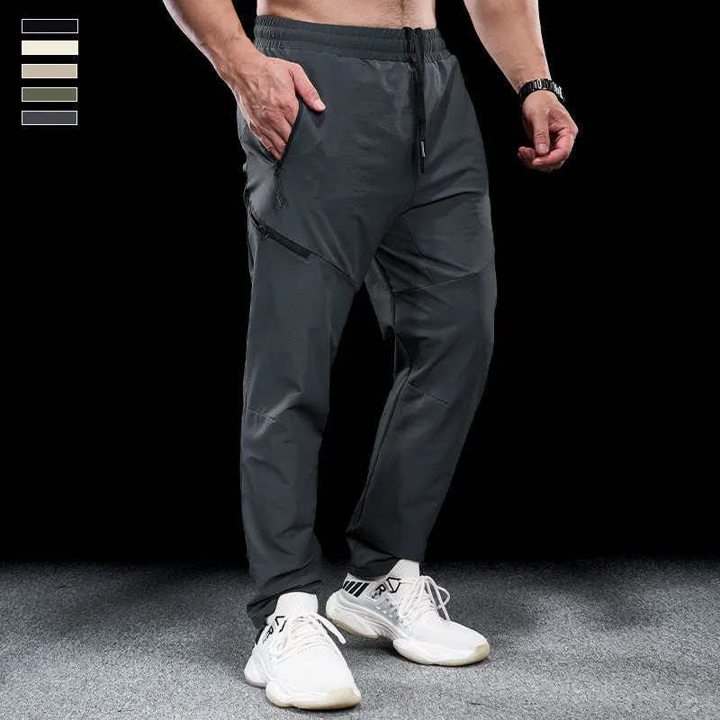 Men's waterproof quick-drying nylon workout trousers in multiple colours for sports and exercise