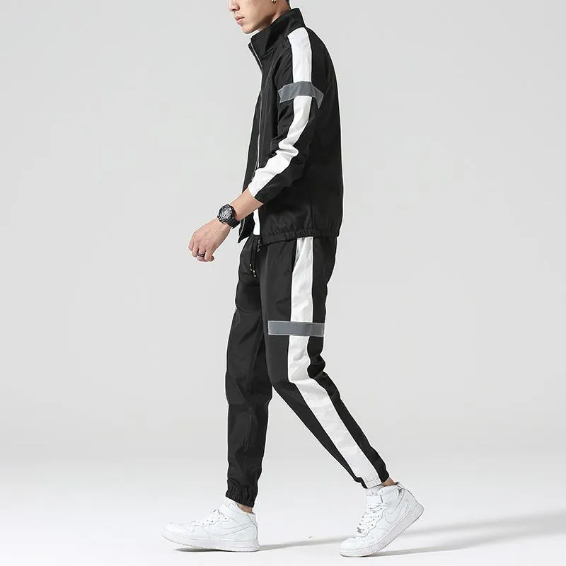 Men's polyester sportswear suit with stand collar jacket and loose fit trousers in black