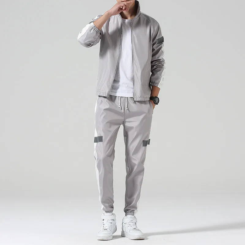Men's polyester sportswear suit with stand collar jacket and loose fit trousers in black
