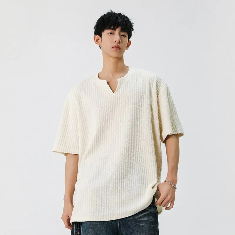 Men's casual loose fit short sleeve V-neck t-shirt in solid beige colour with drop shoulder design