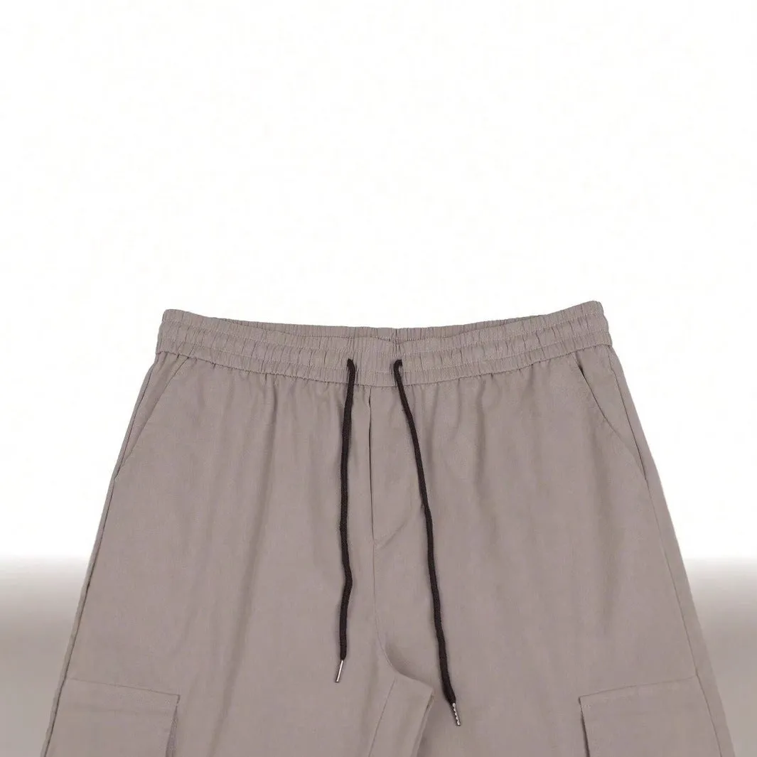 Workwear casual pants with drawstring elastic waist, solid colour, polyester fibre, skinny leg, black colour option