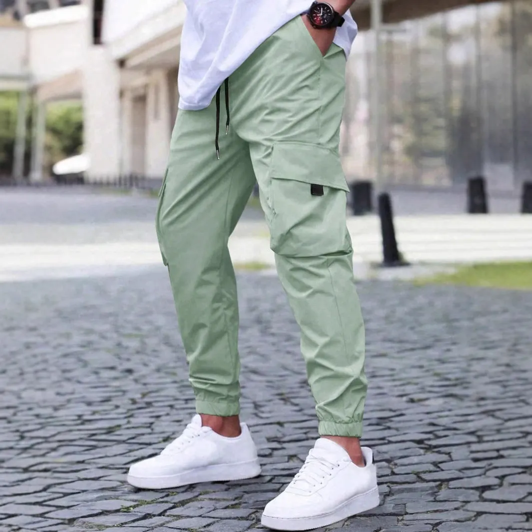 Workwear casual pants with drawstring elastic waist, solid colour, polyester fibre, skinny leg, black colour option