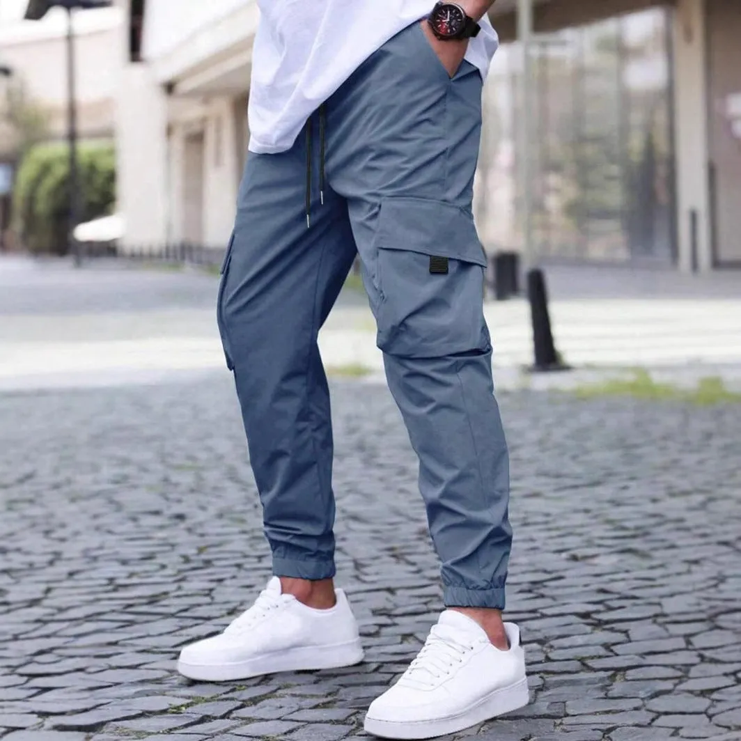 Workwear casual pants with drawstring elastic waist, solid colour, polyester fibre, skinny leg, black colour option