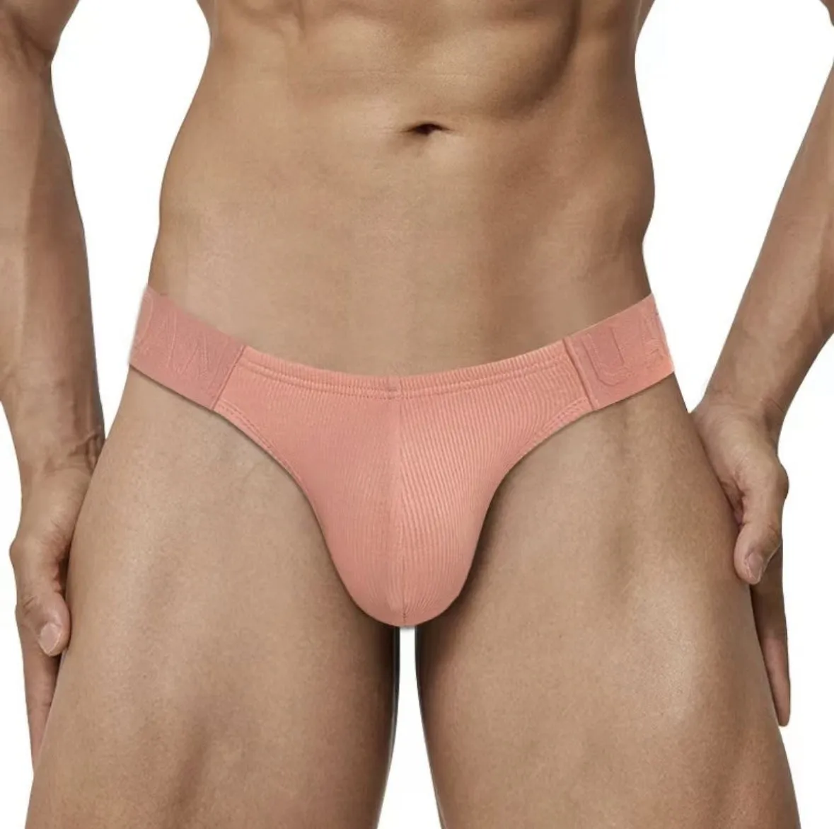 Polyester national triangle low waist seamless briefs in six colours – black, white, pink, purple, green, yellow – on white background