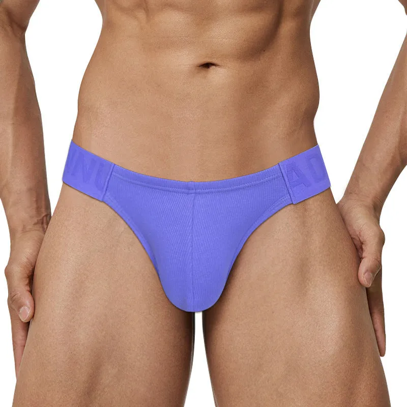 Polyester national triangle low waist seamless briefs in six colours – black, white, pink, purple, green, yellow – on white background