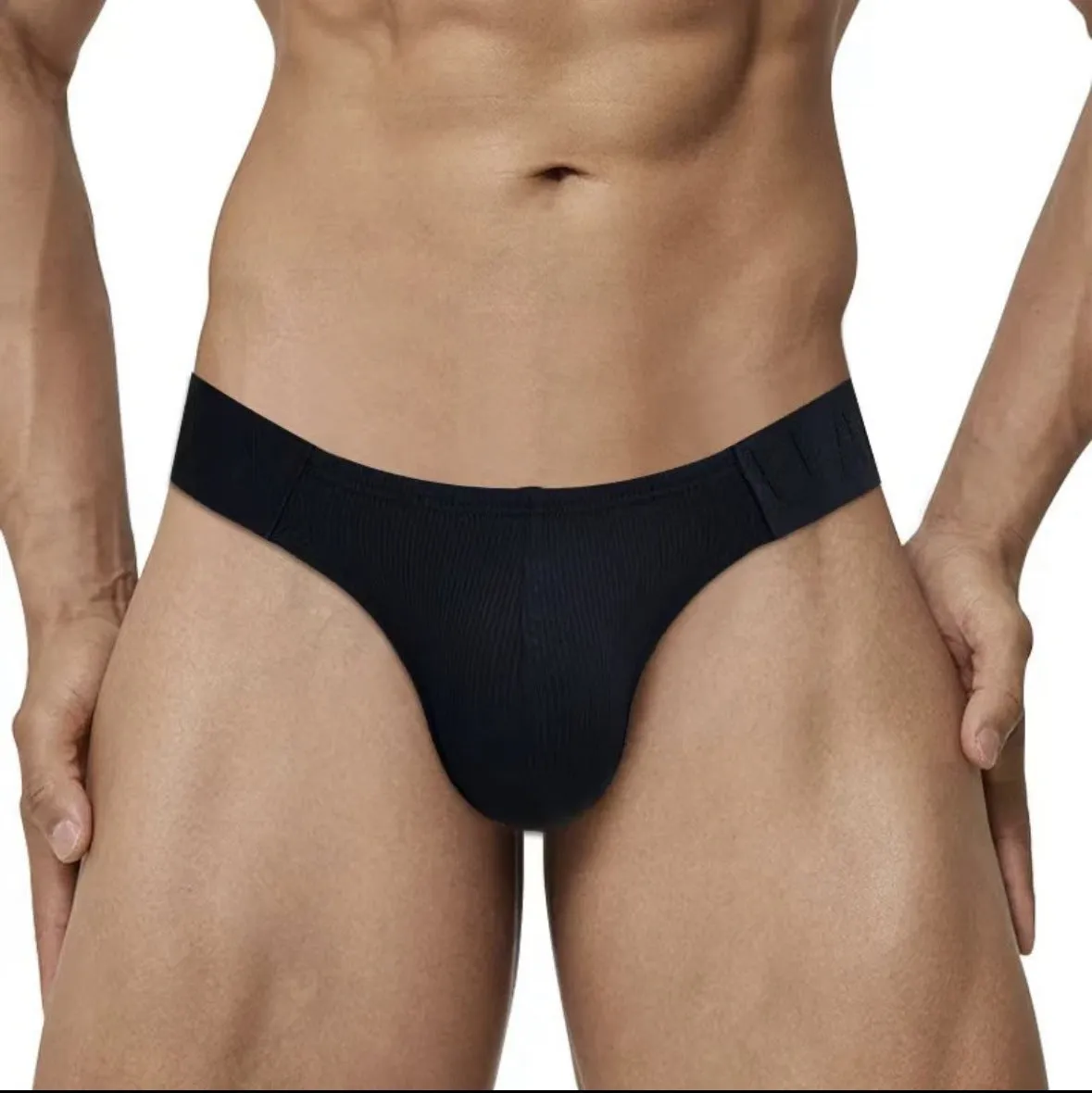 Polyester national triangle low waist seamless briefs in six colours – black, white, pink, purple, green, yellow – on white background