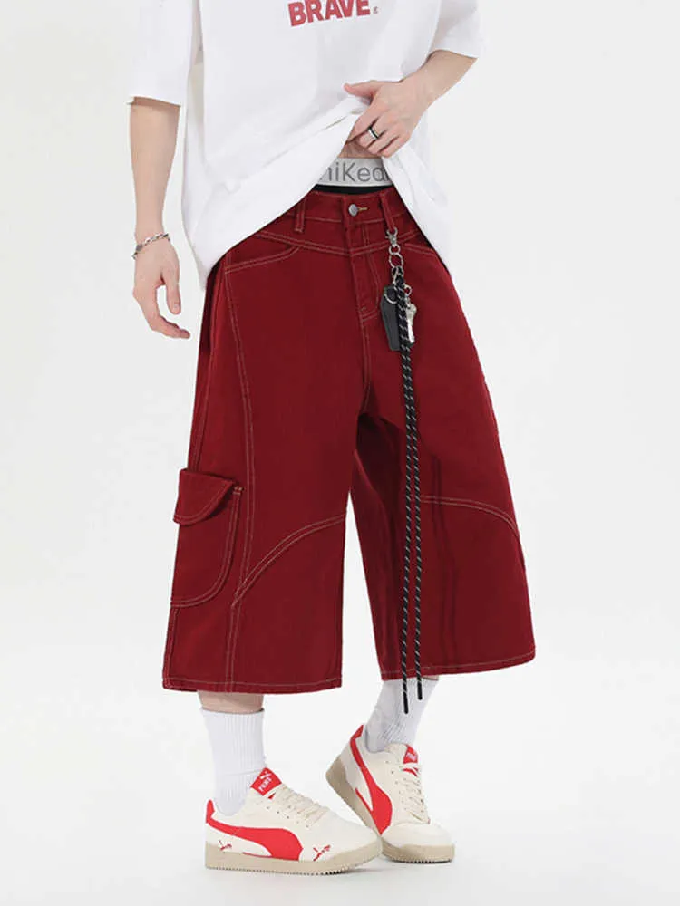 Retro denim workwear shorts with multiple pockets in wide-leg cropped fit