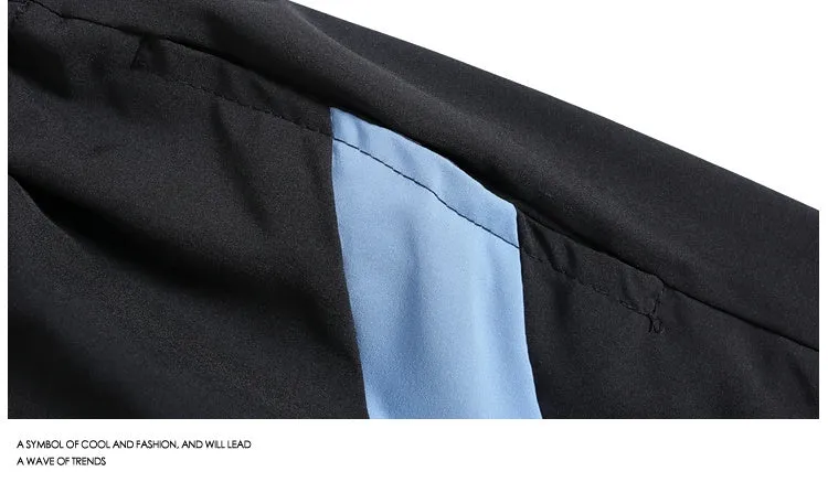 Black quick-drying sports shorts with elastic waistband and loose straight-leg design