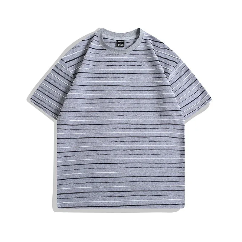 Loose fit striped T-shirt in apricot, black, yellow, grey or pink colours with round neck and half sleeves