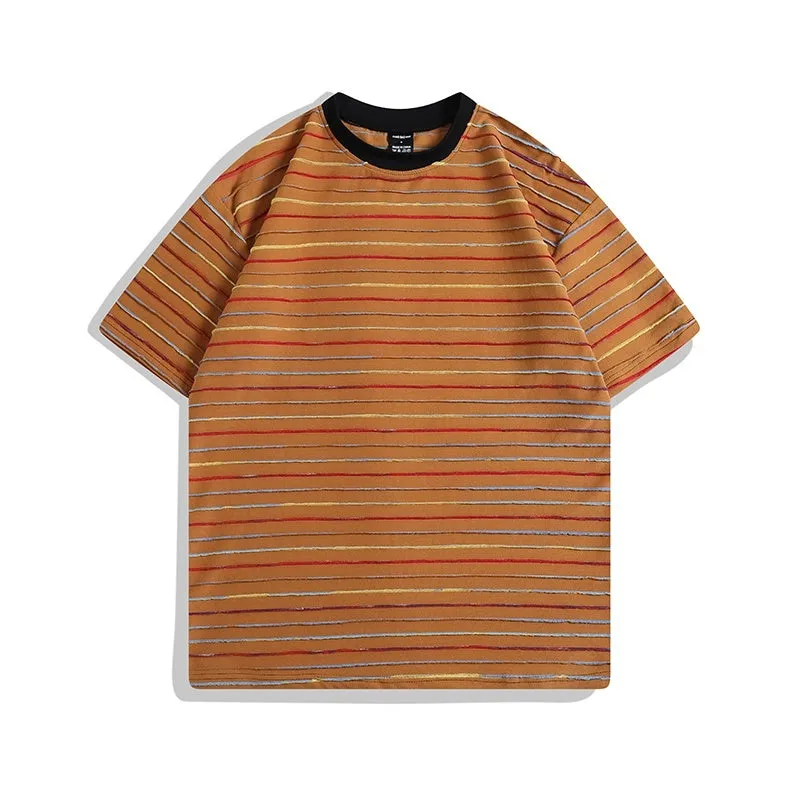 Loose fit striped T-shirt in apricot, black, yellow, grey or pink colours with round neck and half sleeves
