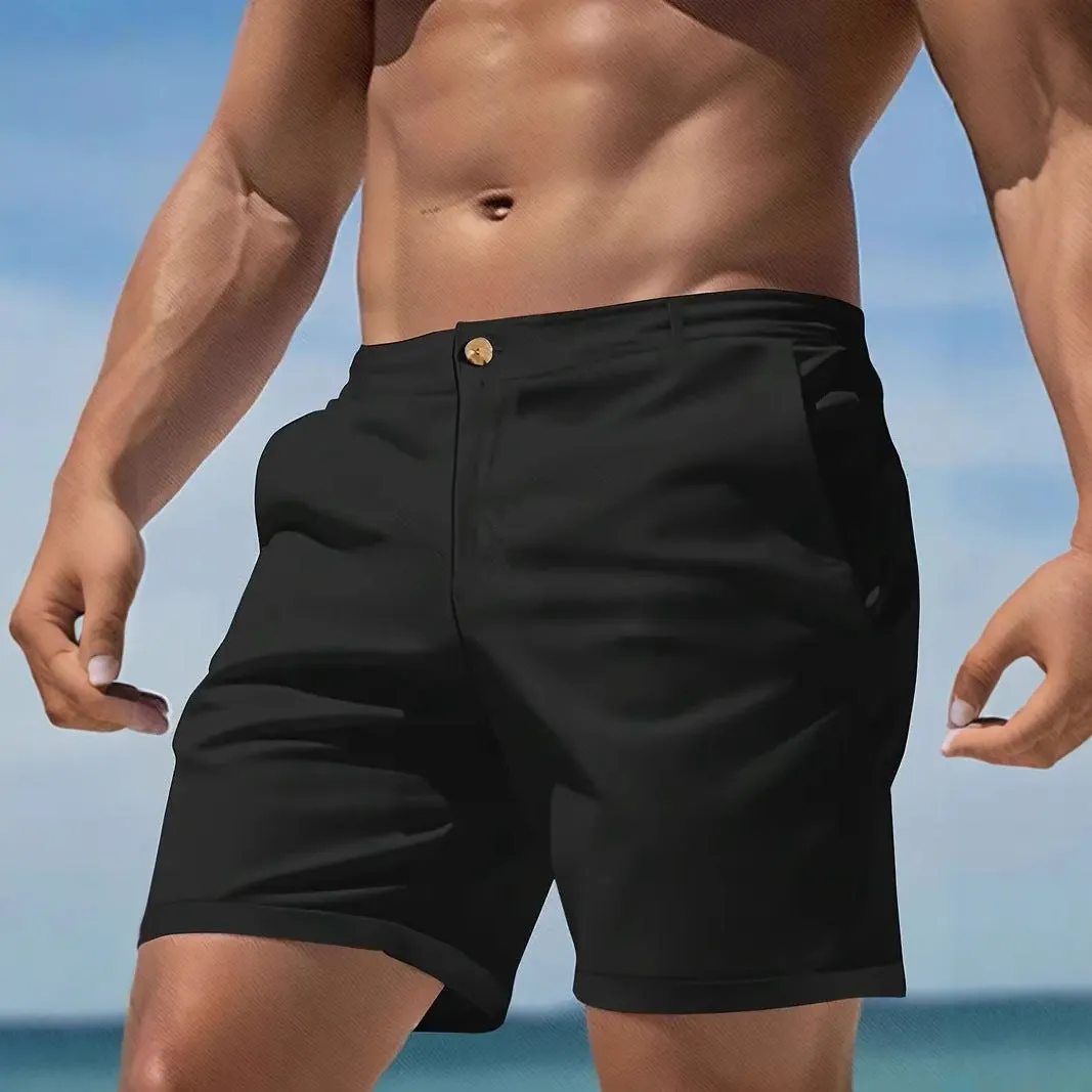 Man wearing grey straight-leg casual cotton blend sports shorts on a neutral background.