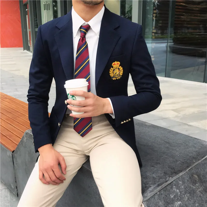 Men's dark blue suit jacket with flat lapel collar and two-button front on display