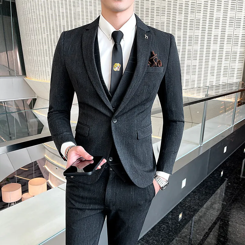 Slim fit men's business suit in black or dark grey with cotton blend fabric construction