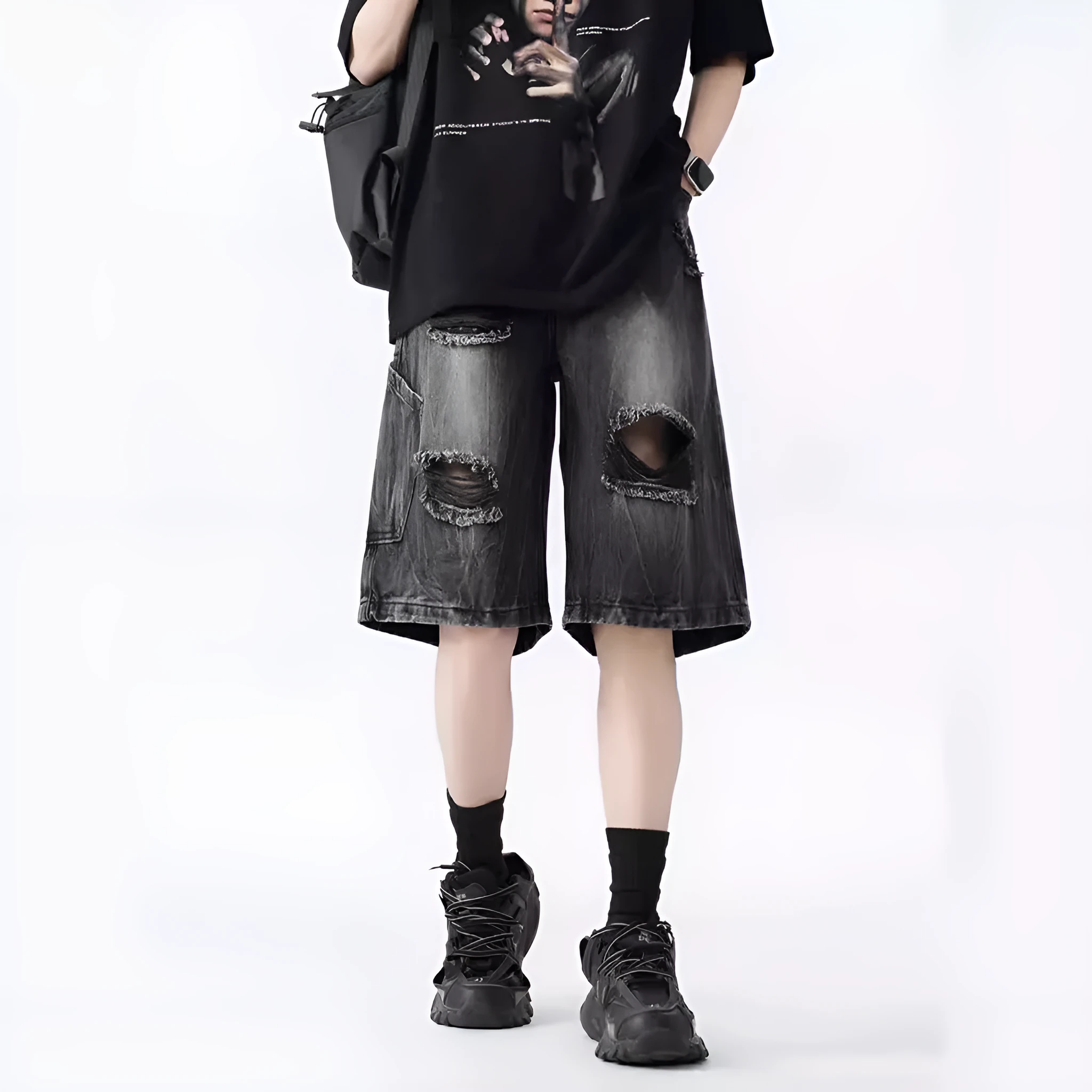 Retro loose-fit ripped denim shorts in washed black or blue with distressed detailing
