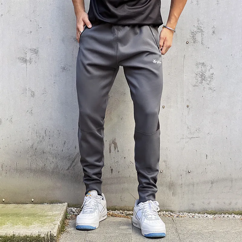 Stretch polyester sweatpants with zip pockets in deep gray, panel design, Asian sizing M-XXL