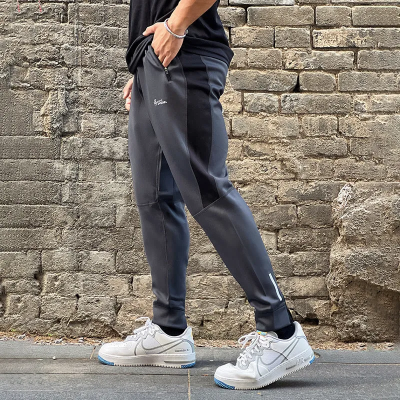 Stretch polyester sweatpants with zip pockets in deep gray, panel design, Asian sizing M-XXL