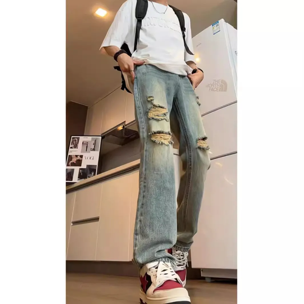 American V retro tattered jeans in blue cotton denim loose fit straight leg for women