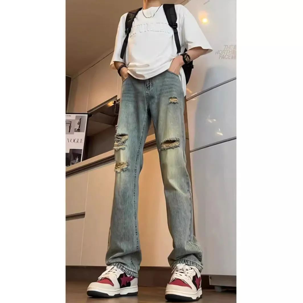 American V retro tattered jeans in blue cotton denim loose fit straight leg for women