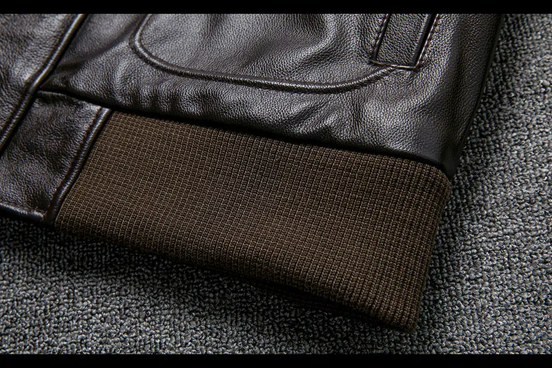 Pure first layer cowhide leather flight suit in black with slim fit, zipper front, and ribbed hem
