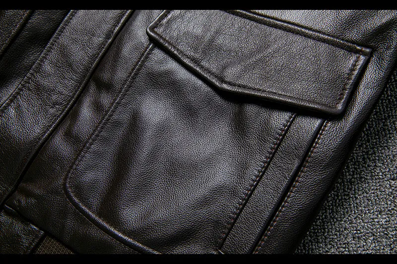 Pure first layer cowhide leather flight suit in black with slim fit, zipper front, and ribbed hem