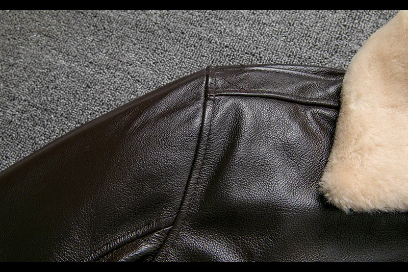 Pure first layer cowhide leather flight suit in black with slim fit, zipper front, and ribbed hem