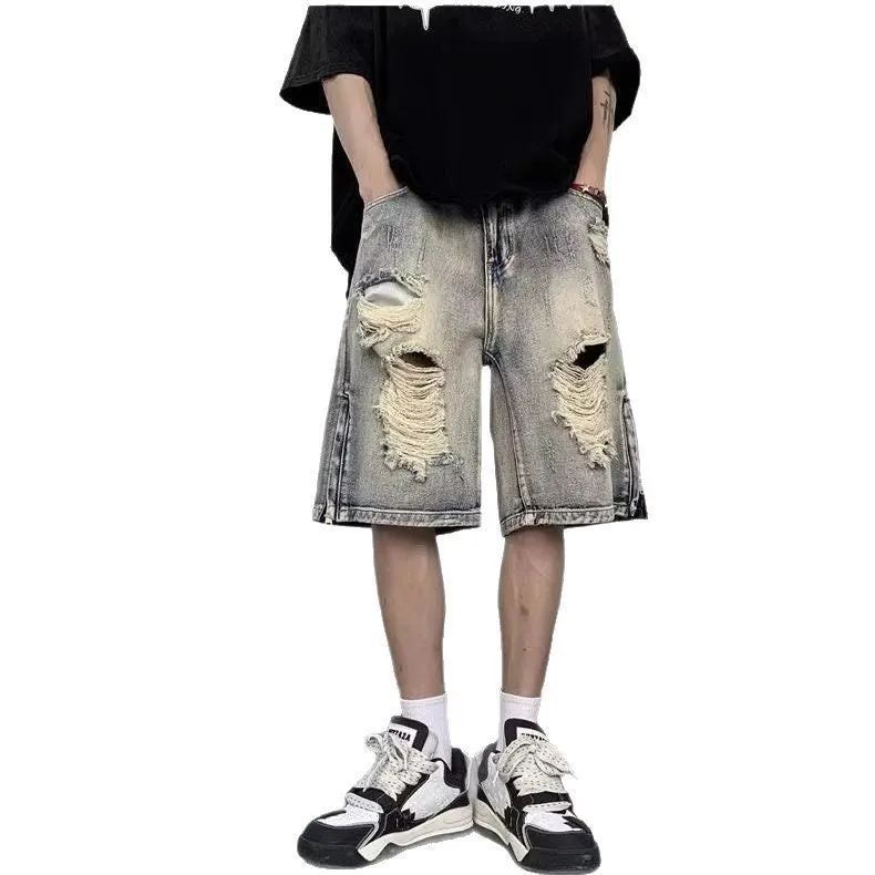 Blue retro style wide leg denim shorts with tattered detailing and loose fit